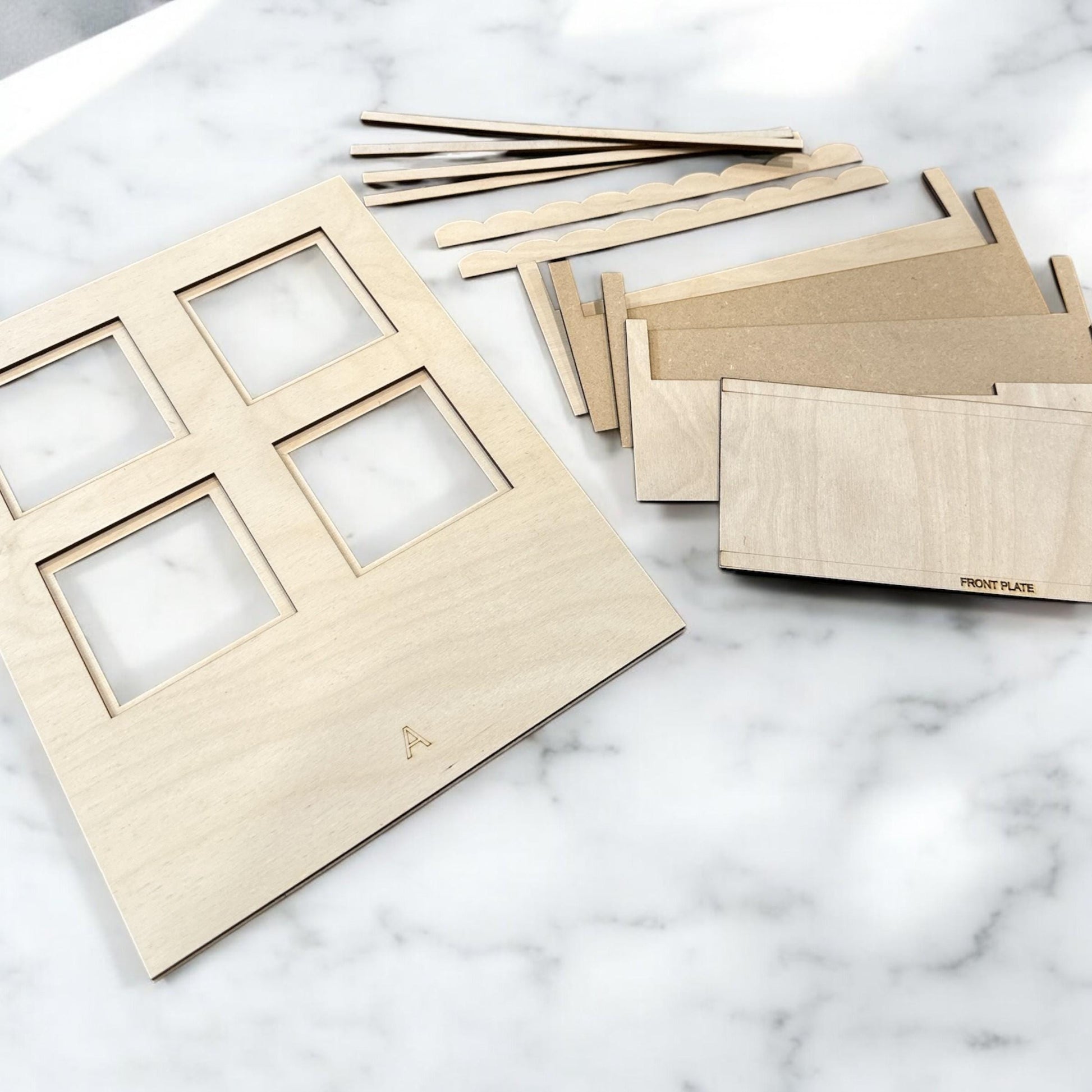 DIY Unfinished Window Interchange for Seasonal Inserts